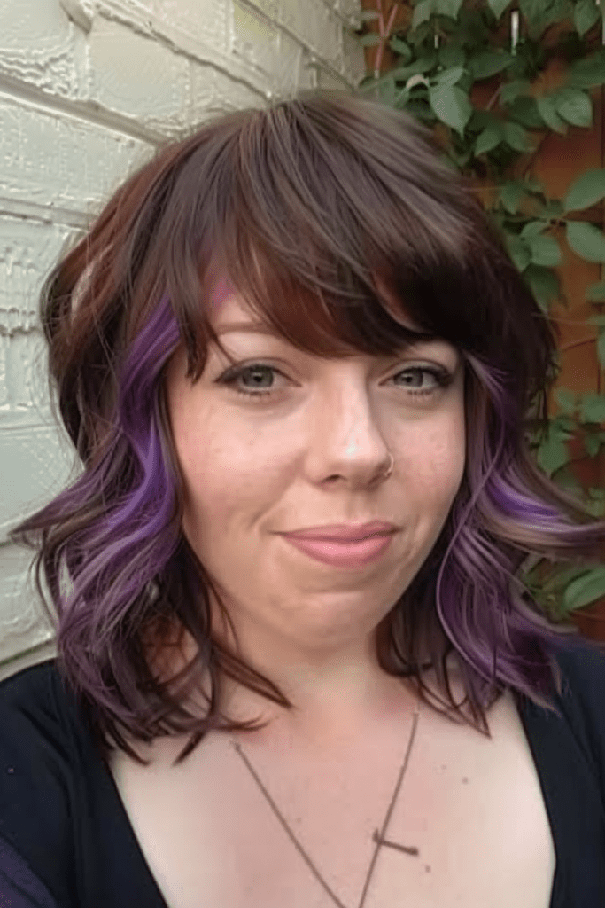 Dark Brown Hair with Purple Highlights and Bangs