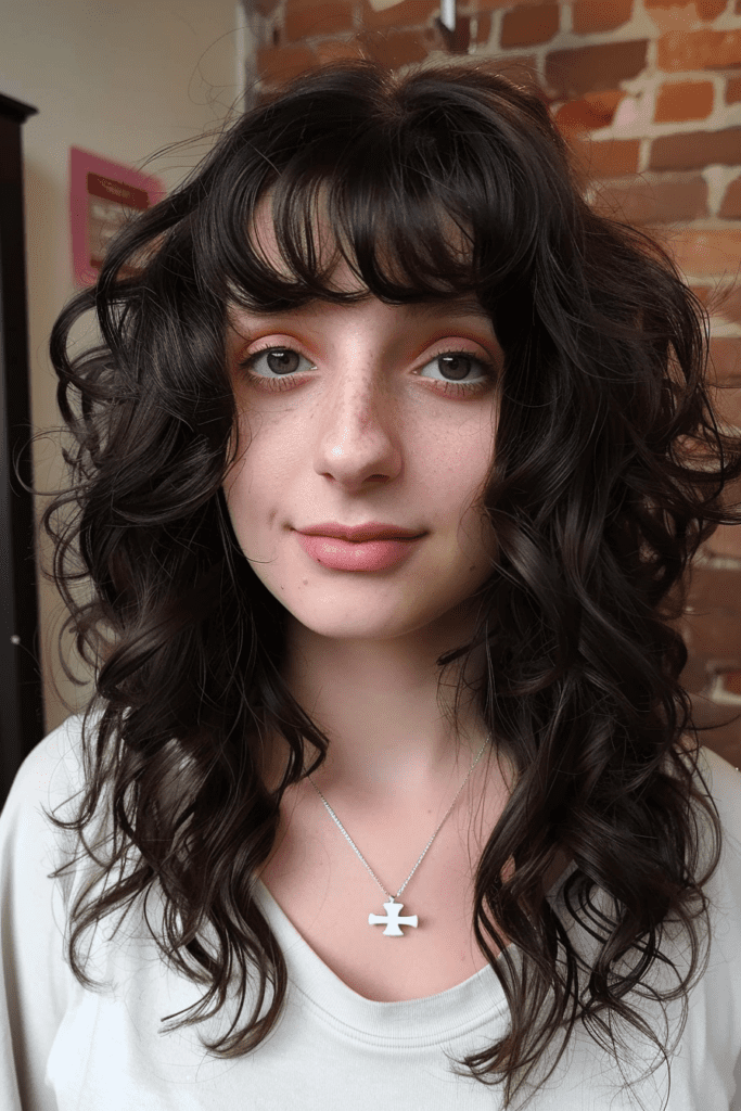 Wolf Cut with Curtain Bangs for Wavy to Curly Hair