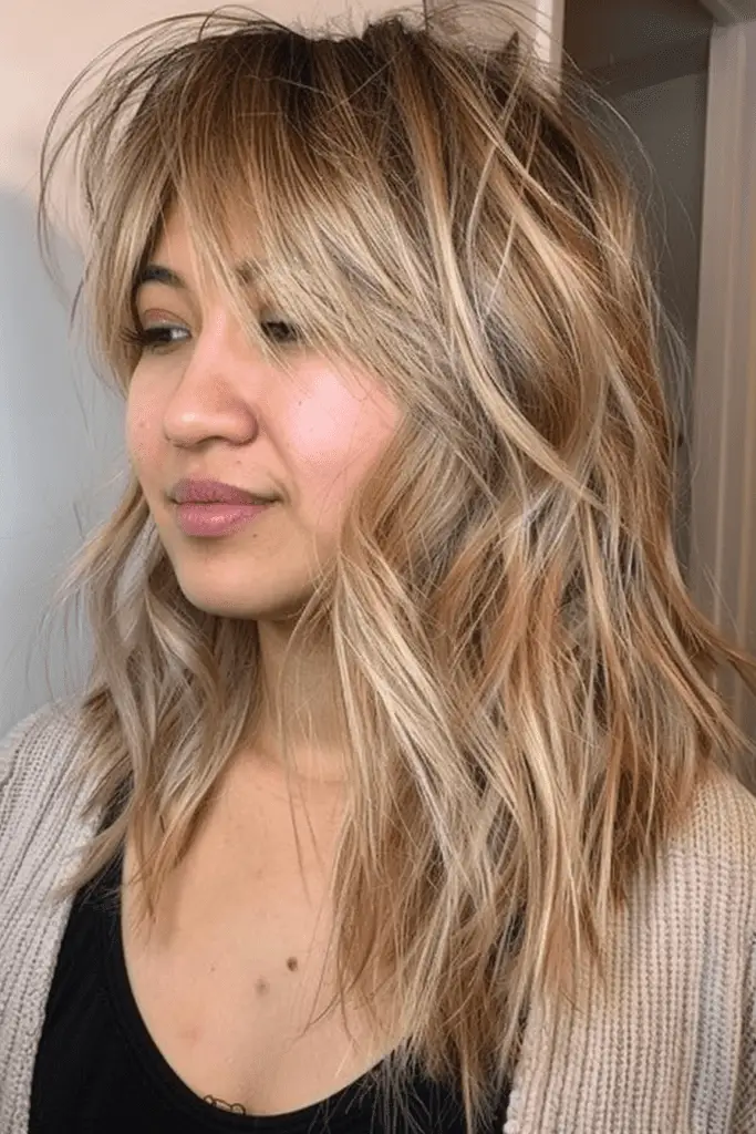 Messy Blonde Shag with Long Curtain Bangs